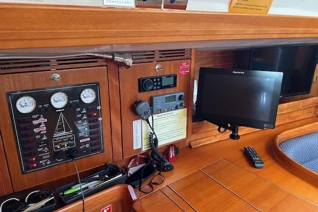 Runaway Yacht Photos Pics Control panel and navigation equipment inside a 2005 Elan 40 yacht cabin.