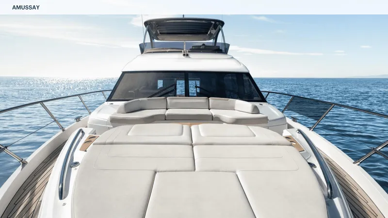 Amussay Yacht Photos Pics Luxurious 2020 Princess F62 yacht on open sea, featuring spacious sun deck and sleek design.