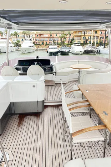 Amussay Yacht Photos Pics Luxurious 2020 Princess F62 yacht interior with elegant seating and dining area.