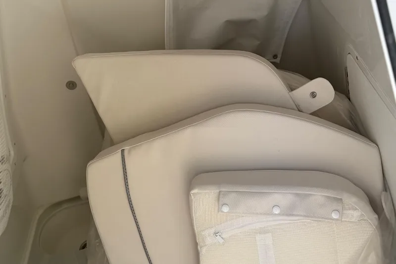  Yacht Photos Pics 2026 Sea Hunt Gamefish 28 interior with beige cushioned seating.