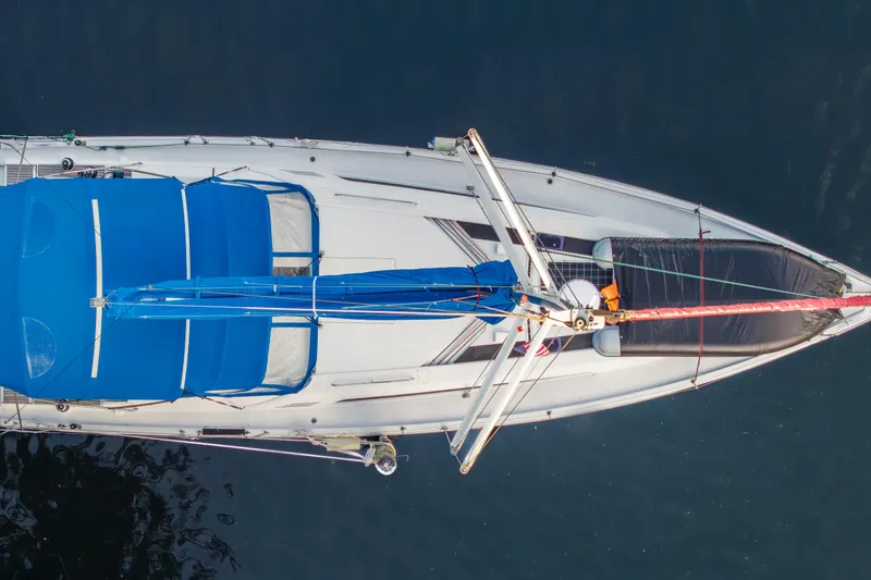 Siman H Yacht Photos Pics Overhead view of 2020 Beneteau Oceanis 46.1 sailboat with blue covers.