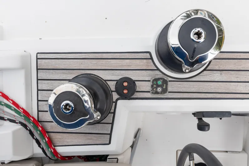 Siman H Yacht Photos Pics Close-up of winches and controls on a 2020 Beneteau Oceanis 46.1 sailboat deck.