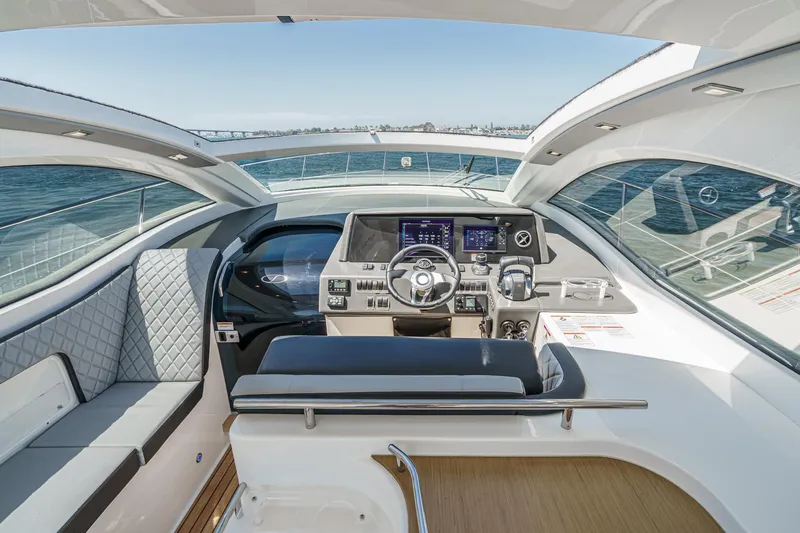 Adamas Yacht Photos Pics Cockpit of 2021 Schaefer 400 yacht with modern controls and panoramic view.