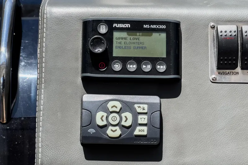 Adamas Yacht Photos Pics Fusion MS-NRX300 marine stereo and remote on Schaefer 400 yacht dashboard, 2021 model.