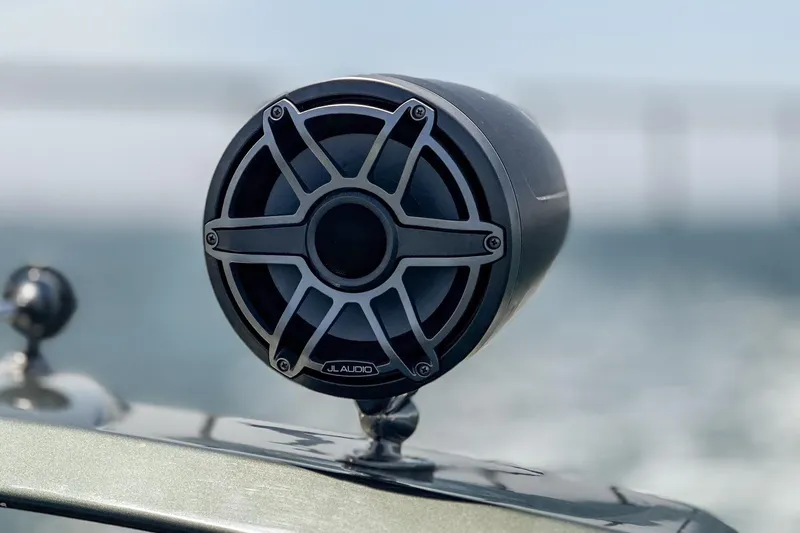 Adamas Yacht Photos Pics Marine speaker on Schaefer 400 yacht, 2021 model, against a blurred ocean background.