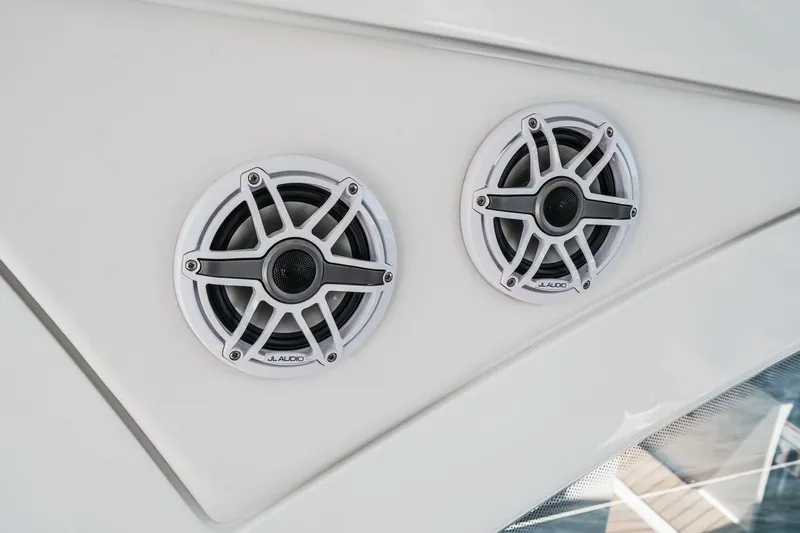 Adamas Yacht Photos Pics Speakers on 2021 Schaefer 400 boat, featuring sleek white design.