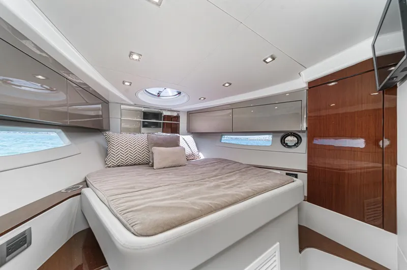 Adamas Yacht Photos Pics Luxurious cabin interior of 2021 Schaefer 400 yacht with modern design and comfortable bedding.