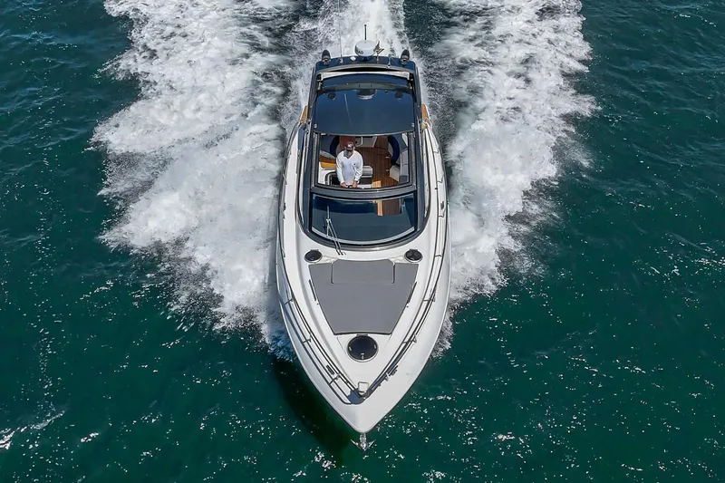 Adamas Yacht Photos Pics Aerial view of 2021 Schaefer 400 yacht cruising on open water.