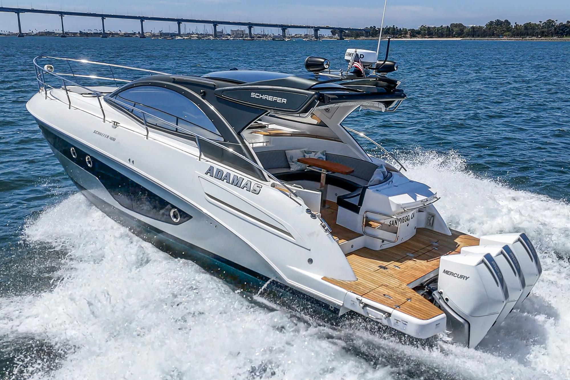 Luxury Schaefer 400 yacht cruising on open water, 2021 model.