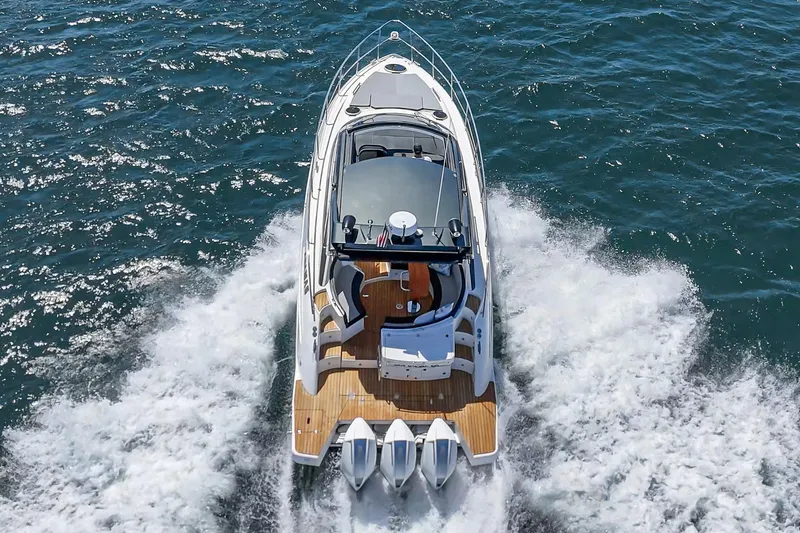 Adamas Yacht Photos Pics 2021 Schaefer 400 yacht cruising on open water, aerial view.