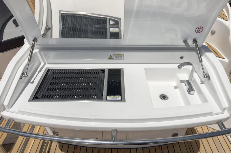 Adamas Yacht Photos Pics Outdoor kitchen on Schaefer 400 yacht, featuring grill and sink, 2021 model.