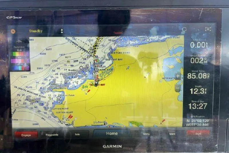 Maple Leaf Yacht Photos Pics Garmin GPS display on a 1981 Bertram Convertible boat showing navigation map.