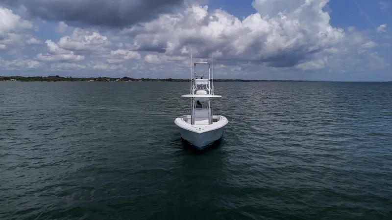  Yacht Photos Pics Venture 34 boat from 2001 on open water under cloudy sky.