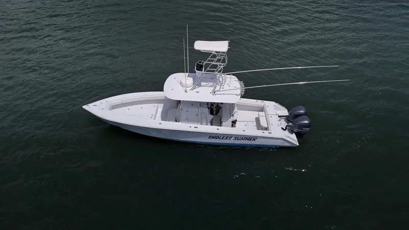  Yacht Photos Pics Aerial view of 2001 Venture 34 boat on calm water.