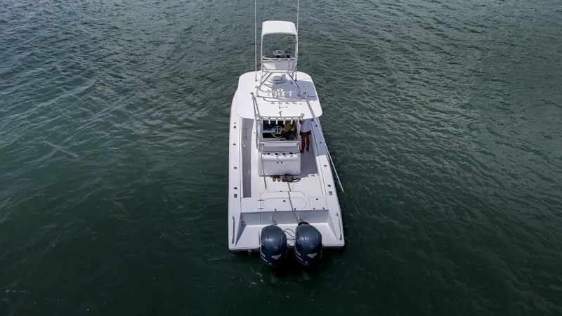  Yacht Photos Pics Aerial view of 2001 Venture 34 boat on open water.