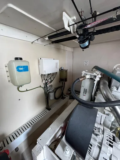 Aubreezy Yacht Photos Pics Engine room of 2007 Luhrs 41 Express boat, showcasing mechanical components and systems.