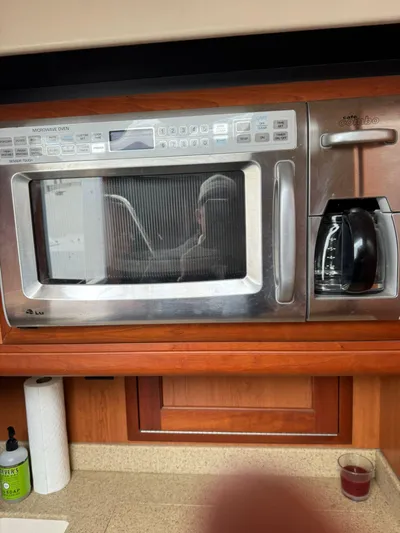 Aubreezy Yacht Photos Pics Built-in microwave and coffee maker in a 2007 Luhrs 41 Express yacht kitchen.