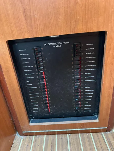 Aubreezy Yacht Photos Pics 2007 Luhrs 41 Express DC distribution panel, 24-volt system, wooden paneling.