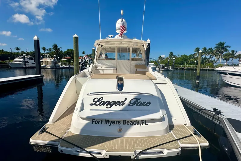  Yacht Photos Pics 2015 Pursuit SC 365i Sport Coupe docked at Fort Myers Beach, Florida marina.