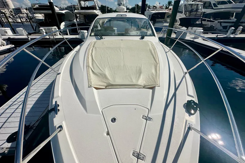 Yacht Photos Pics 2015 Pursuit SC 365i Sport Coupe docked at marina, front view.