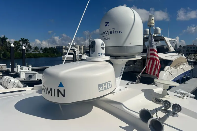  Yacht Photos Pics 2015 Pursuit SC 365i Sport Coupe with Garmin and TracVision equipment at marina.