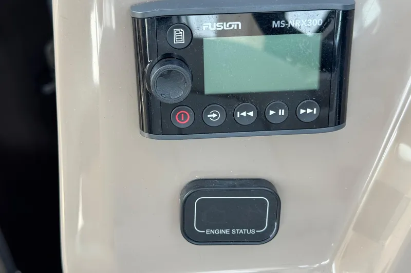 Don't Ask Yacht Photos Pics Control panel of a 2018 Regal 28 Express boat with Fusion MS-NRX300 display.