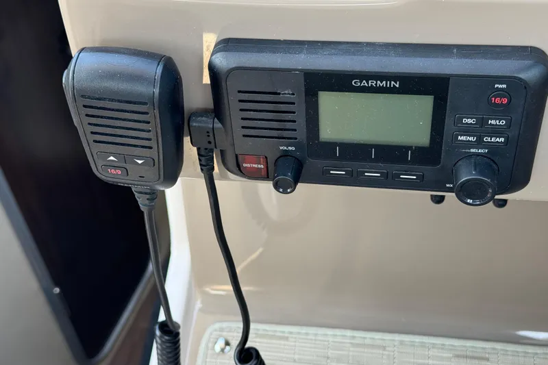 Don't Ask Yacht Photos Pics Garmin marine radio system on 2018 Regal 28 Express boat dashboard.