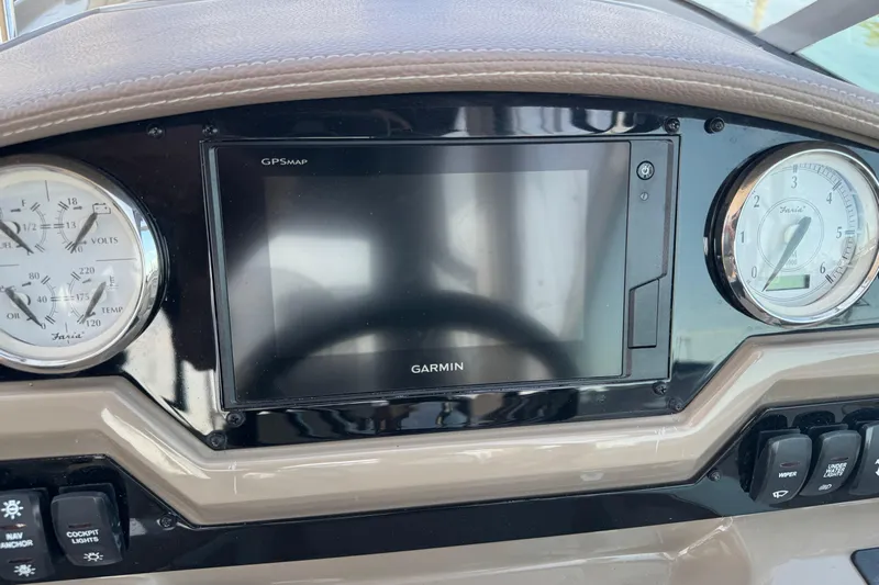 Don't Ask Yacht Photos Pics Dashboard of 2018 Regal 28 Express boat with Garmin GPS and gauges.
