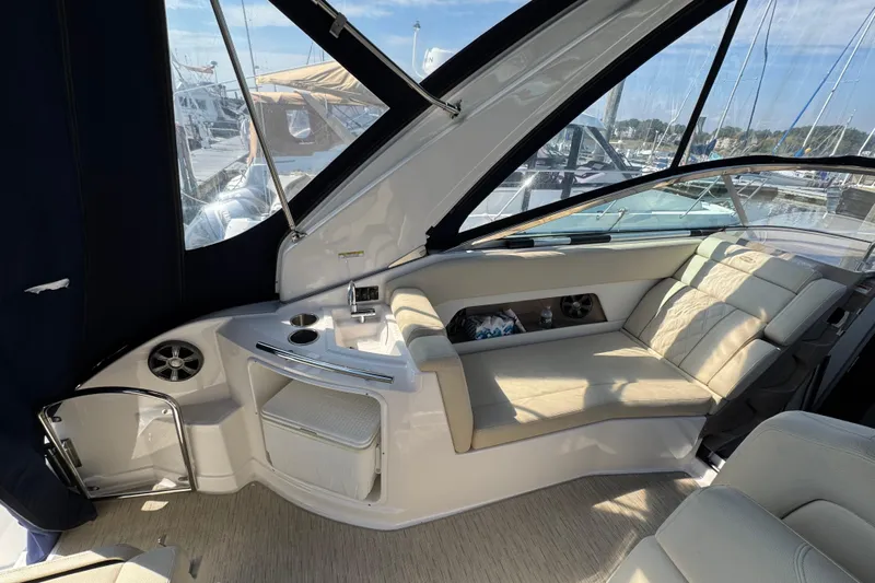 Don't Ask Yacht Photos Pics 2018 Regal 28 Express boat interior with beige seating and modern amenities.