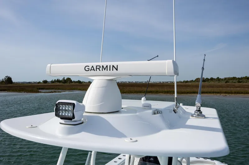  Yacht Photos Pics 2024 Yellowfin 34 Offshore boat with Garmin radar system on open water.