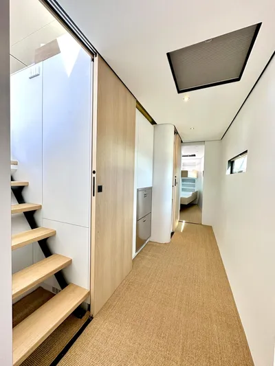  Yacht Photos Pics Modern interior of 2025 Vaan R5 yacht with sleek design and wooden accents.