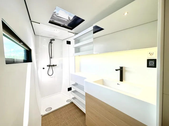  Yacht Photos Pics Modern bathroom in 2025 Vaan R5 yacht with sleek shower and minimalist design.
