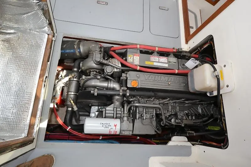 Grey Goose Yacht Photos Pics Engine compartment of a 2002 West Bay 31 boat, featuring a Yanmar engine.