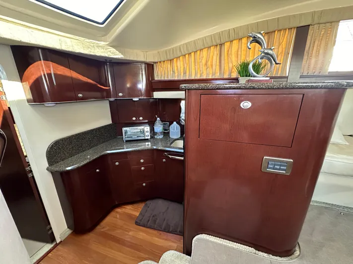 Debs Dinghy Yacht Photos Pics Luxurious 2007 Sea Ray 40 Motor Yacht interior with elegant wood cabinetry and modern amenities.
