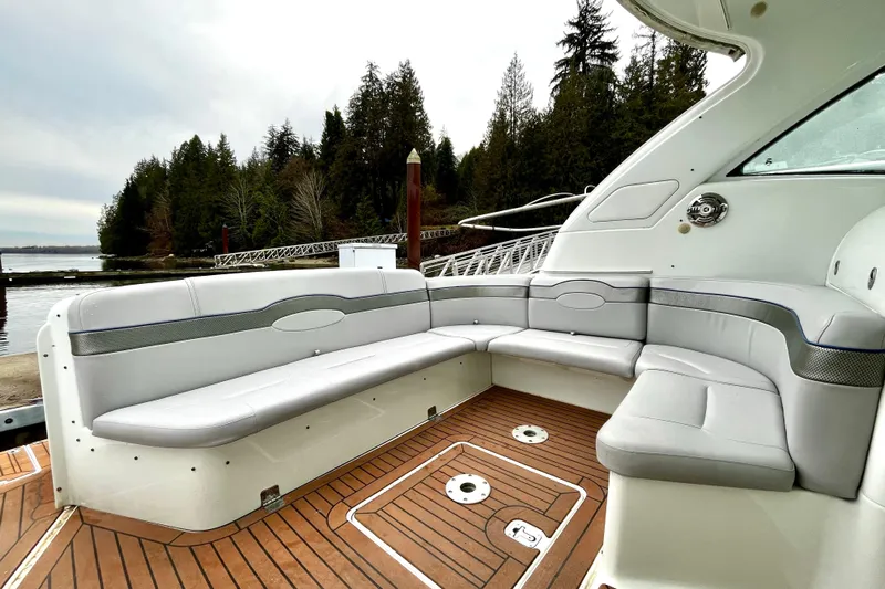 Formula 45 Yacht Photos Pics Luxurious seating on 2008 Formula 45 Yacht with scenic waterfront backdrop.