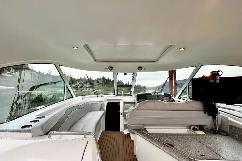 Formula 45 Yacht Photos Pics Interior of a 2008 Formula 45 Yacht with sleek seating and panoramic windows.