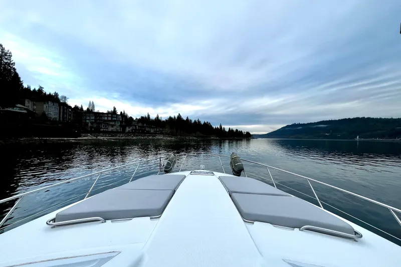 Formula 45 Yacht Photos Pics Front view of a 2008 Formula 45 Yacht cruising on a serene lake.