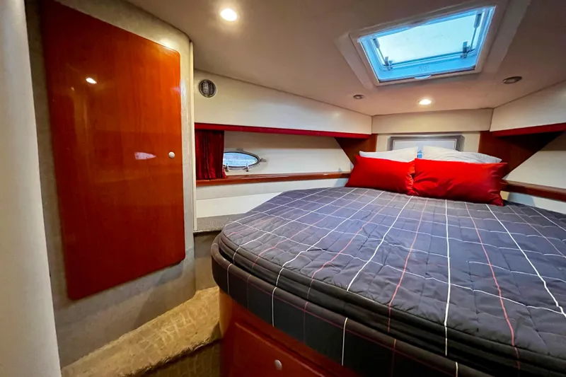 Formula 45 Yacht Photos Pics Luxurious cabin interior of 2008 Formula 45 Yacht with cozy bed and skylight.