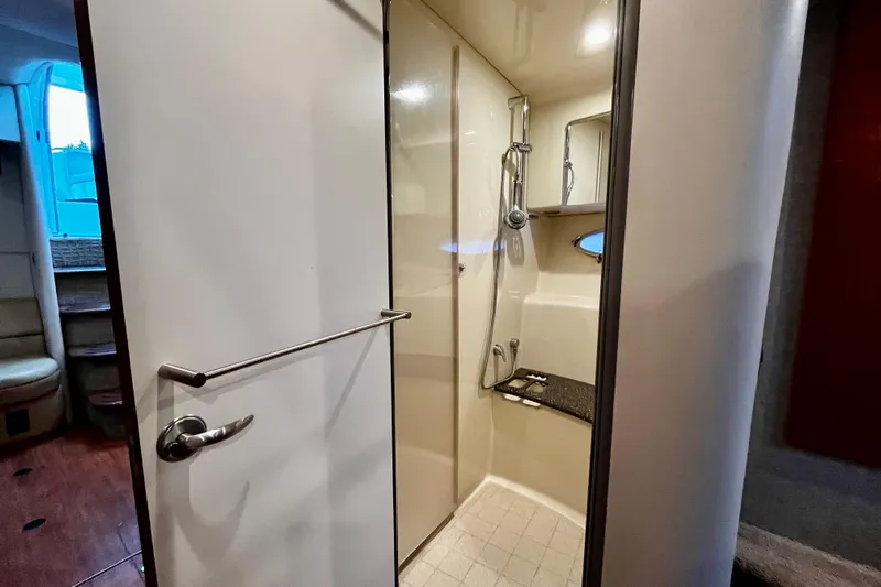 Formula 45 Yacht Photos Pics 2008 Formula 45 Yacht bathroom with shower, modern fixtures, and sleek design.