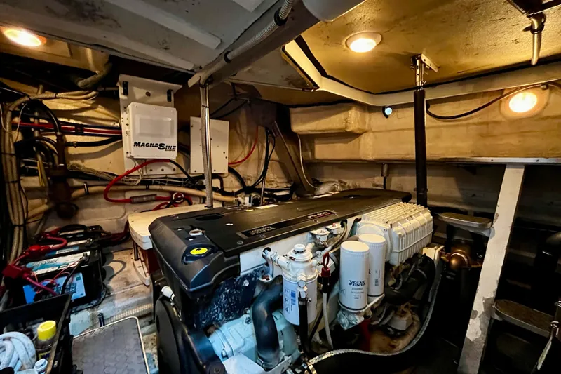 Formula 45 Yacht Photos Pics Engine room of a 2008 Formula 45 Yacht, featuring a well-maintained engine and electrical systems.