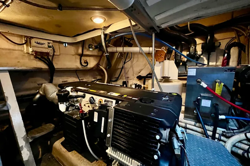 Formula 45 Yacht Photos Pics Engine room of a 2008 Formula 45 Yacht, showcasing mechanical components and wiring.