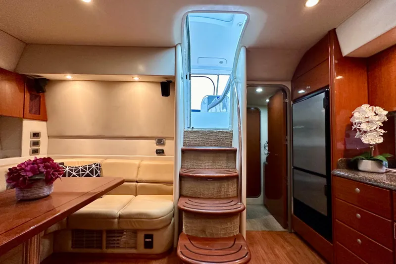 Formula 45 Yacht Photos Pics Interior of 2008 Formula 45 Yacht with elegant seating, stairs, and modern amenities.