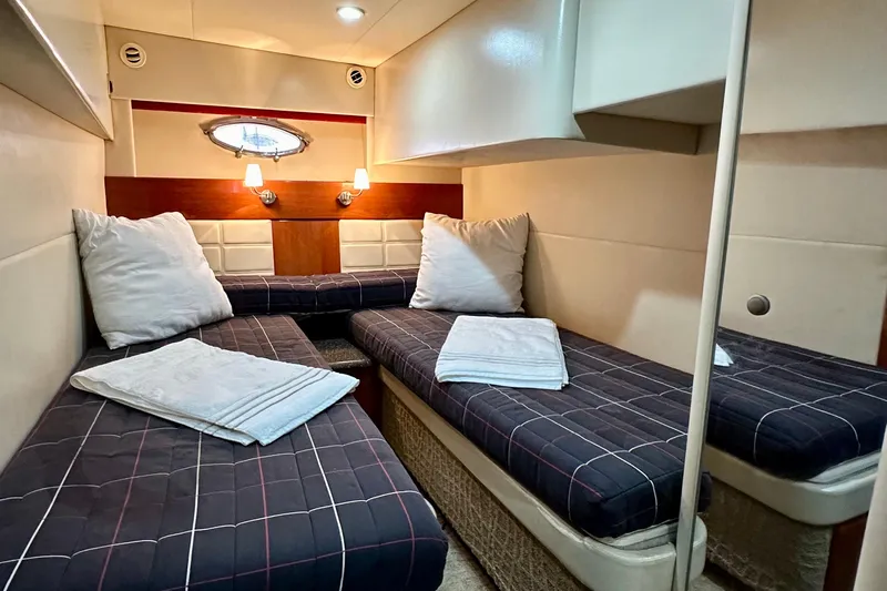 Formula 45 Yacht Photos Pics Interior cabin of 2008 Formula 45 Yacht with twin beds and cozy lighting.