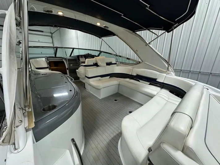  Yacht Photos Pics 2014 Formula 370 Super Sport boat interior with white seating and sleek design.