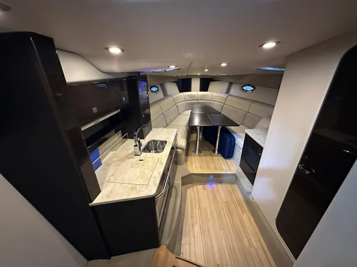  Yacht Photos Pics Interior of 2014 Formula 370 Super Sport yacht with modern kitchen and seating area.