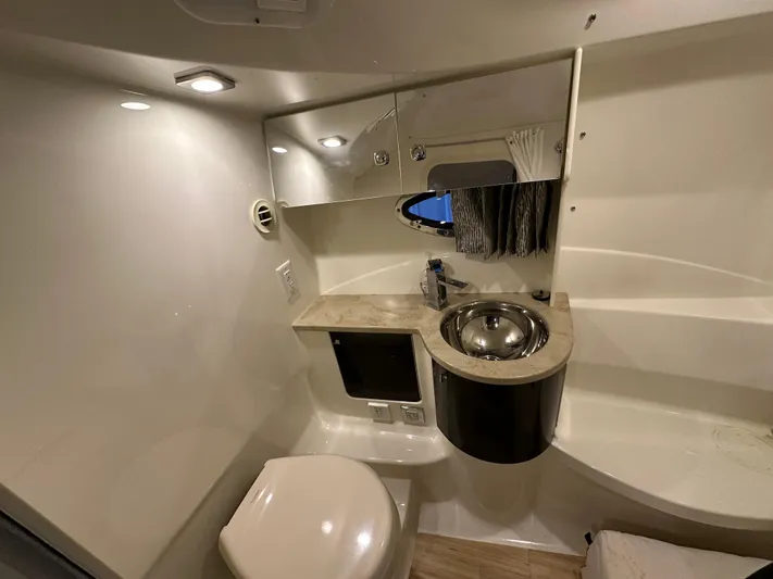 Yacht Photos Pics 2014 Formula 370 Super Sport bathroom with modern fixtures and compact design.