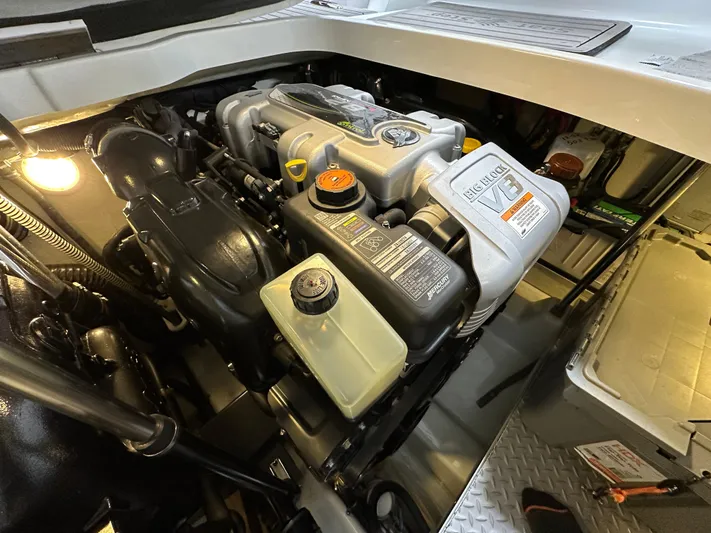  Yacht Photos Pics Engine compartment of a 2014 Formula 370 Super Sport boat, showcasing detailed components.
