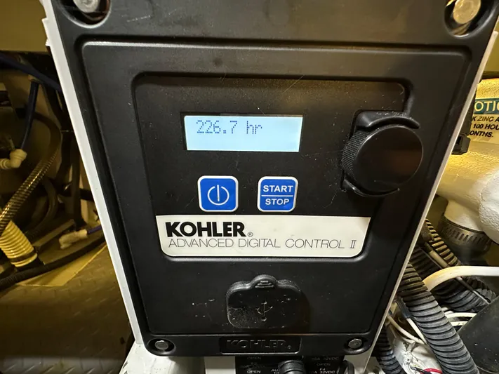  Yacht Photos Pics Kohler digital control panel displaying 226.7 hours on a 2014 Formula 370 Super Sport.