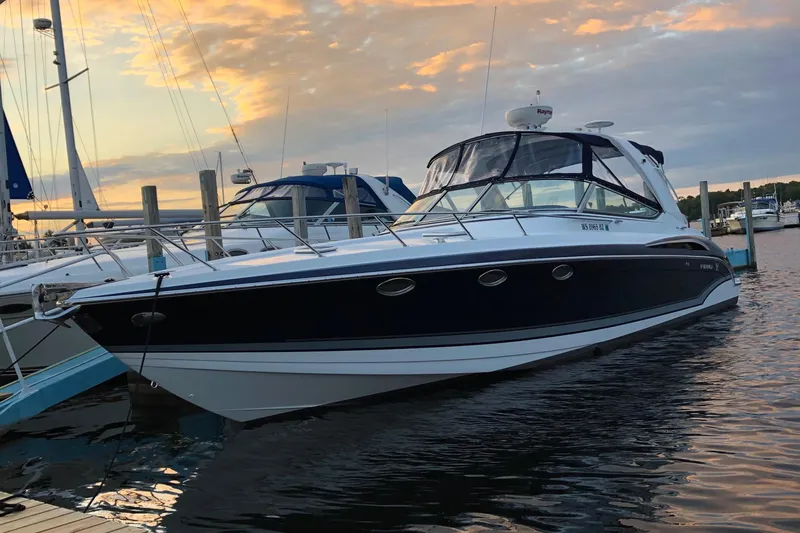  Yacht Photos Pics 2014 Formula 370 Super Sport boat docked at sunset.