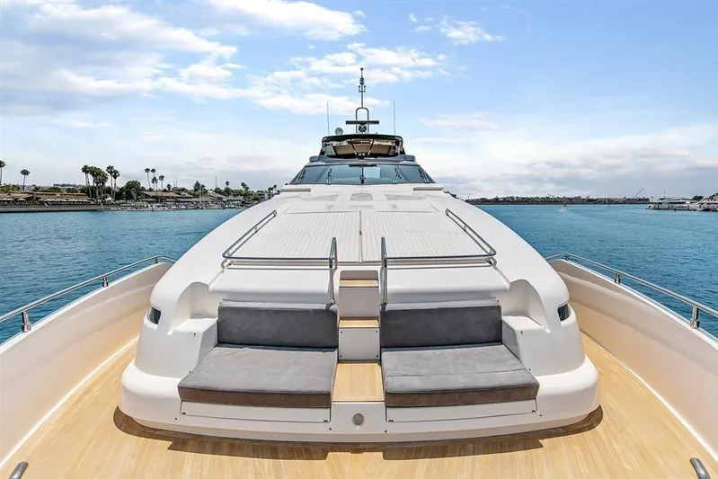 Lontano Yacht Photos Pics Luxurious 2016 Ferretti 960 yacht on serene blue waters, showcasing elegant deck design.